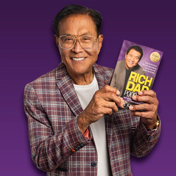 photo of robert holding rich dad poor dad